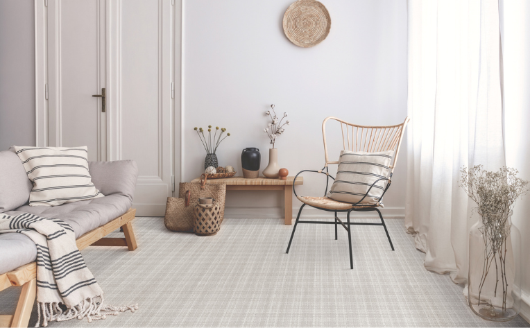 patterned grey carpet in living room